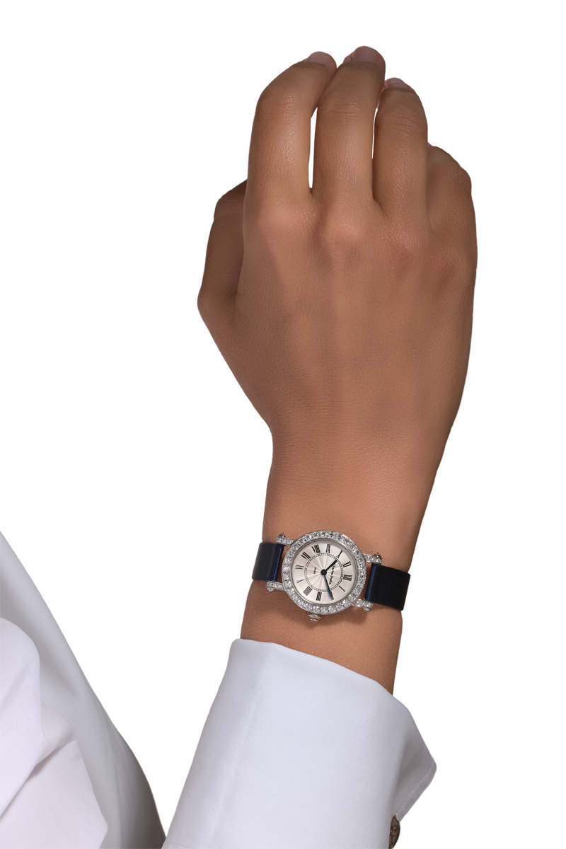 Charles Oudin ASTER Retro 18K white gold round watch set with diamonds, navy satin strap on a ladies’ wrist